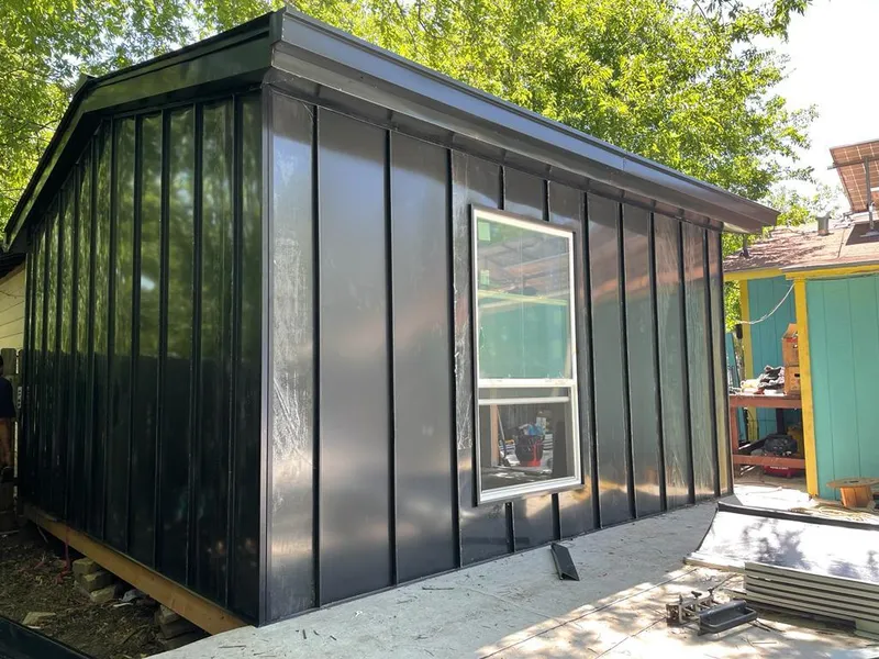 Black standing seam metal wall panels for Metal Roof Installation in Topsham